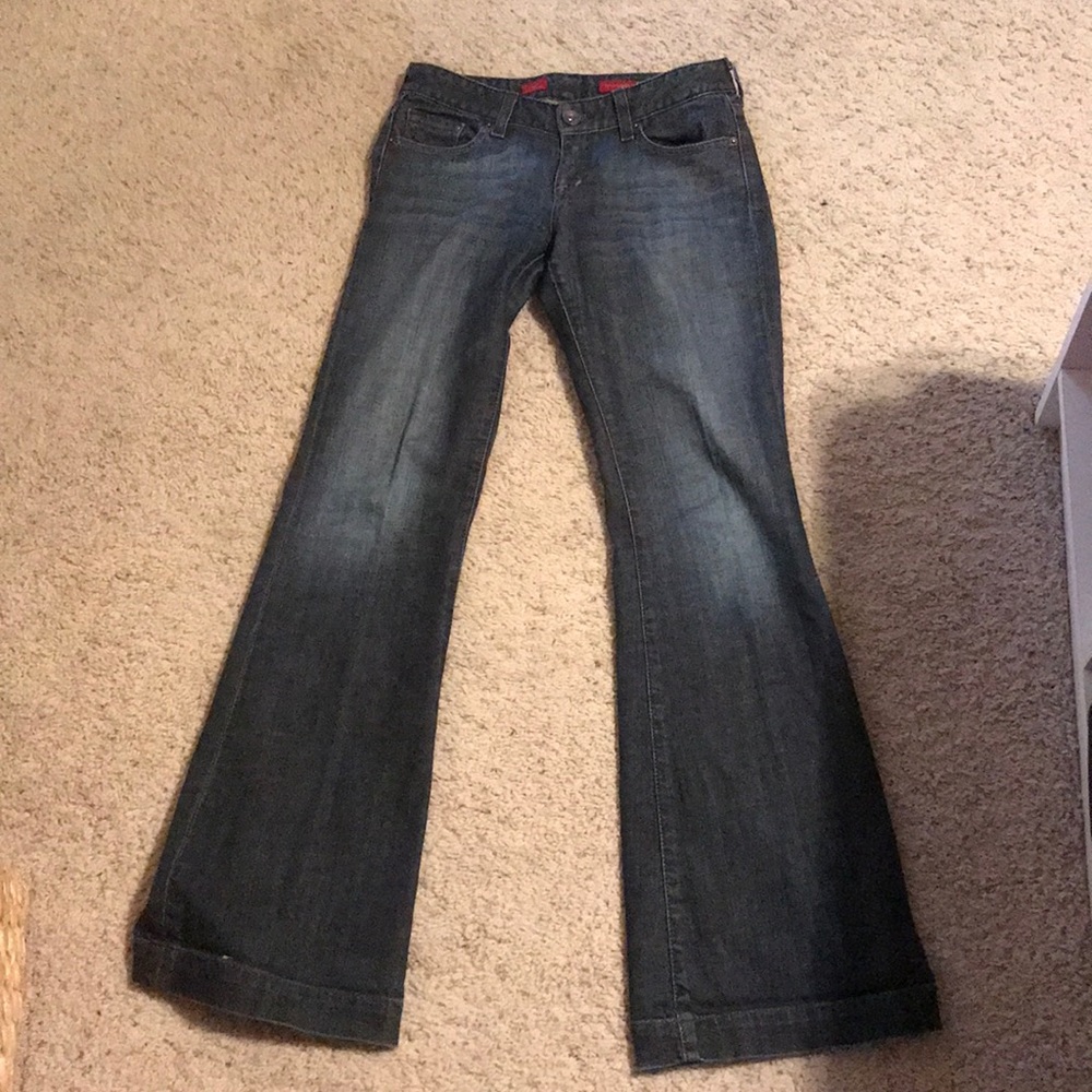Light to dark flare jeans that start at the hip